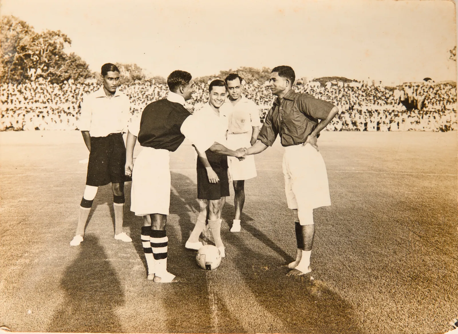 Opening ceremony of Champions Vs Rest football game held in aid of anti TB 1938 signed by Captain Abbas. Calcutta.